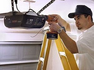 man working on garage door