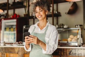 woman holding coffee cup